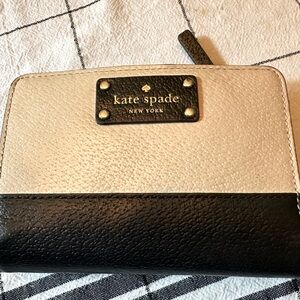 Kate Spade beige and black short wallet with 8 credit card holder inside
